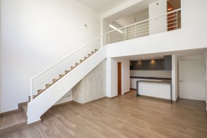 Two-room front-facing loft with balcony, garage and amenities