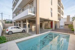 Expandable Duplex with Two Garages and Swimming Pool