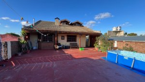 House for Sale on Two Levels with Terrace and Grill